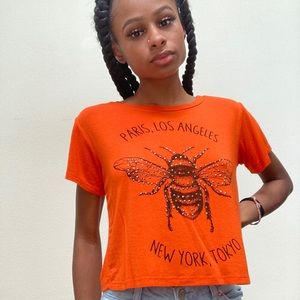 Cities orange crop top